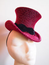 Pink top hat by B Millinery